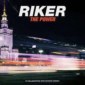 Pre Made Album Cover Bunker a very tall building with a clock tower at night
