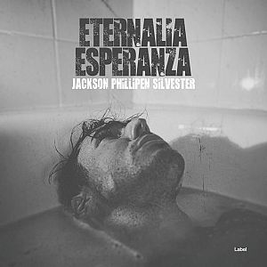Pre Made Album Cover Scorpion a black and white photo of a man in a bathtub