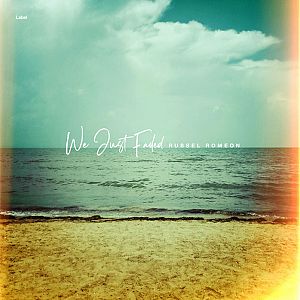 Pre Made Album Cover Spring Rain a picture of a beach with the ocean in the background